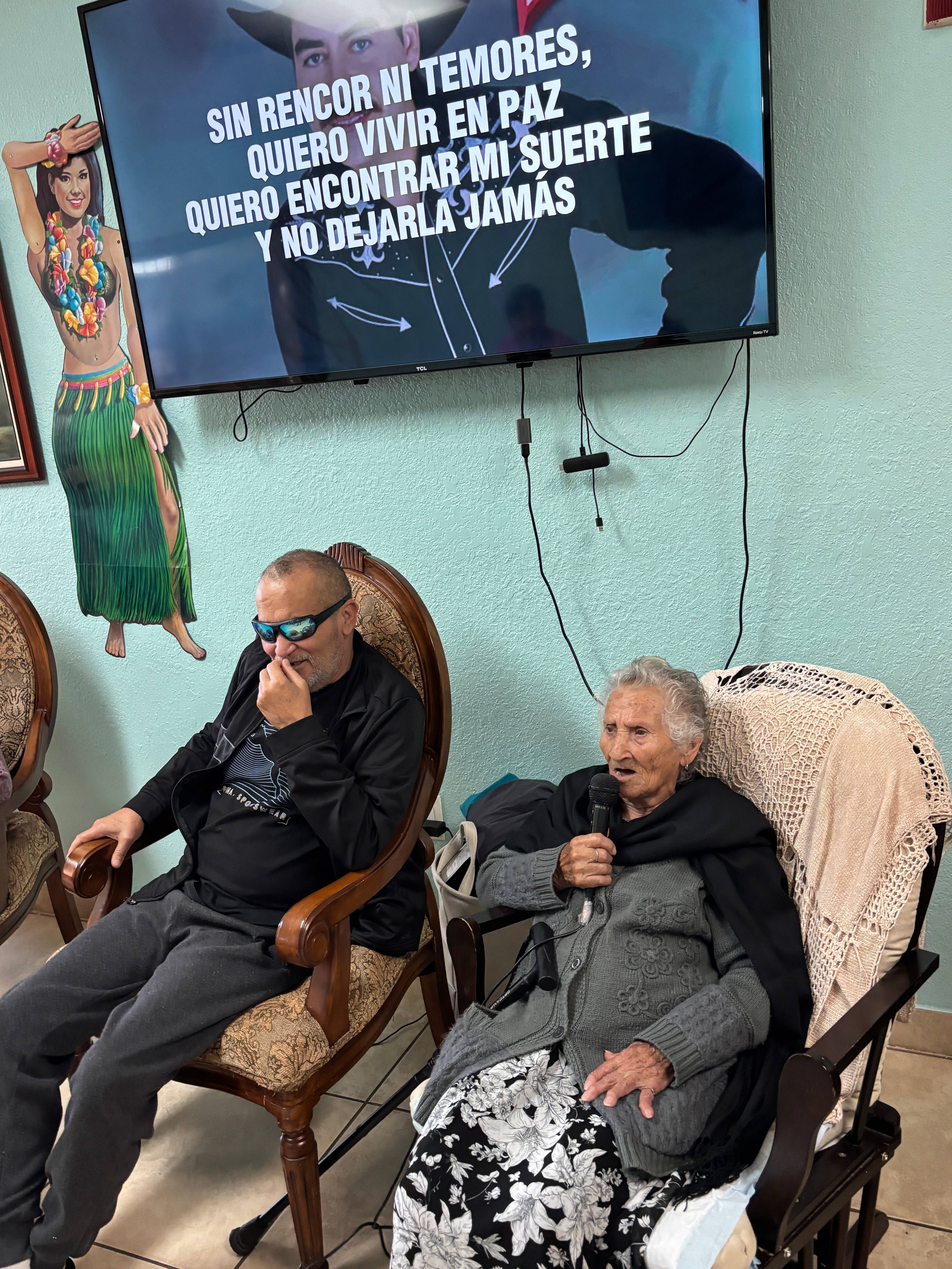Residents enjoying karaoke